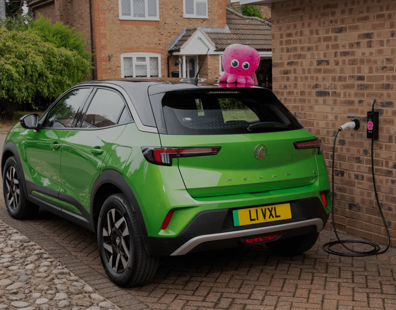 Constantine on an electric car