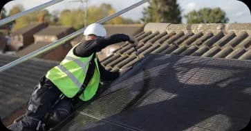 Solar panels being installed on a roof